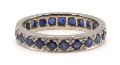 Lot 180 - A sapphire set full eternity ring
