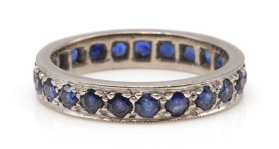 Lot 180 - A sapphire set full eternity ring