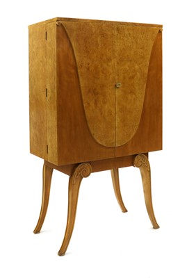 Lot 106 - An Art Deco burr maple cocktail cabinet