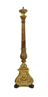 Lot 291 - A carved and giltwood standard lamp
