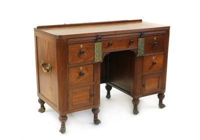 Lot 249 - A colonial campaign teak writing desk