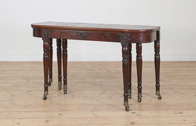 Lot 280 - A mahogany extending dining table