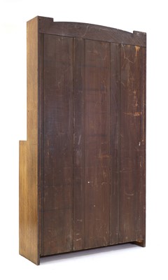Lot 64 - An Arts and Crafts oak open bookcase