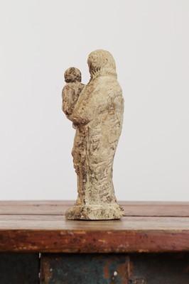 Lot 246 - A limestone carving of the Madonna and Child