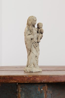 Lot 246 - A limestone carving of the Madonna and Child