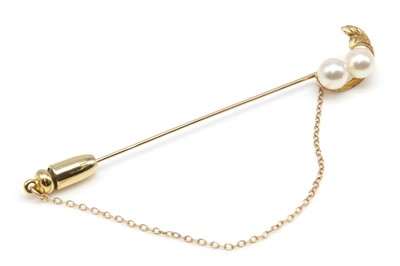 Lot 353 - A two stone cultured pearl stick pin, by Mikimoto, c.1970