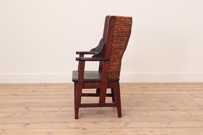 Lot 280 - A jute and pine child's armchair
