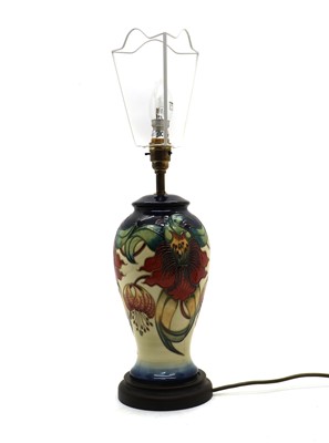 Lot 99 - A Moorcroft pottery 'Anna Lily' pattern table lamp