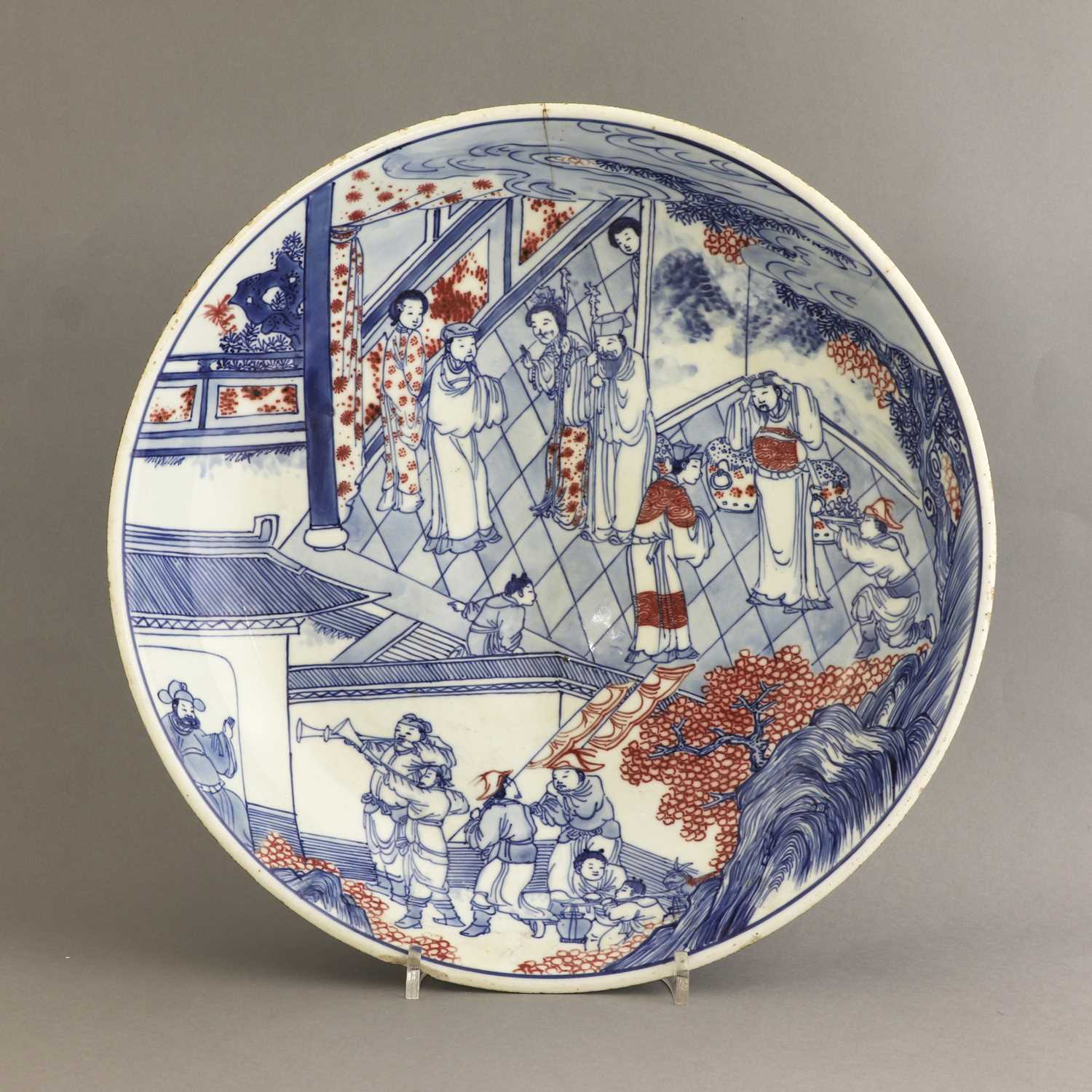 Lot 28 - A Chinese copper red and underglaze-blue charger