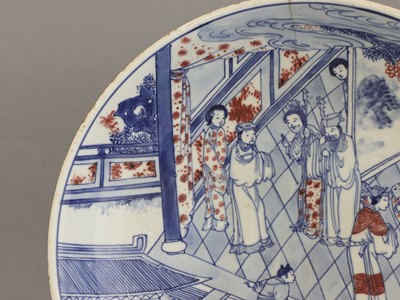 Lot 28 - A Chinese copper red and underglaze-blue charger