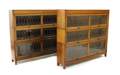 Lot 323 - A pair of Globe Wernicke style sectional bookcases