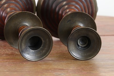 Lot 281 - A pair of oak and bell metal candlesticks