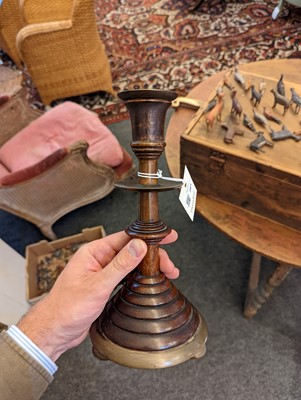Lot 281 - A pair of oak and bell metal candlesticks