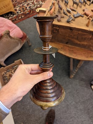 Lot 281 - A pair of oak and bell metal candlesticks