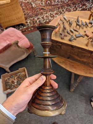 Lot 281 - A pair of oak and bell metal candlesticks