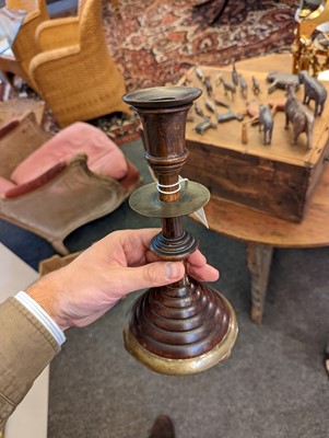 Lot 281 - A pair of oak and bell metal candlesticks