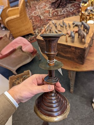 Lot 281 - A pair of oak and bell metal candlesticks
