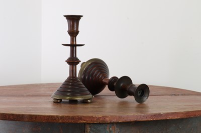 Lot 281 - A pair of oak and bell metal candlesticks