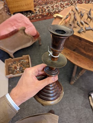 Lot 281 - A pair of oak and bell metal candlesticks