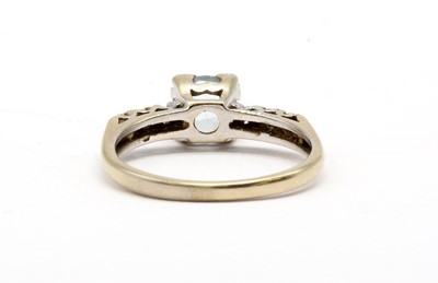 Lot 171 - A white gold aquamarine and diamond ring