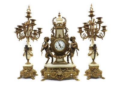 Lot 147 - A gilt-metal and marble clock garniture