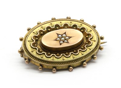 Lot 18 - A Victorian 9ct gold split pearl brooch