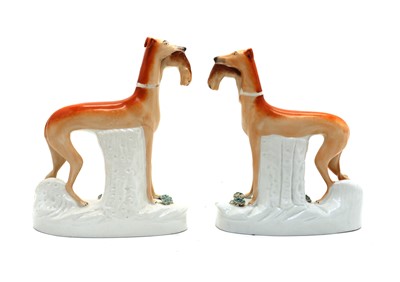 Lot 93 - A pair of Staffordshire pottery figures