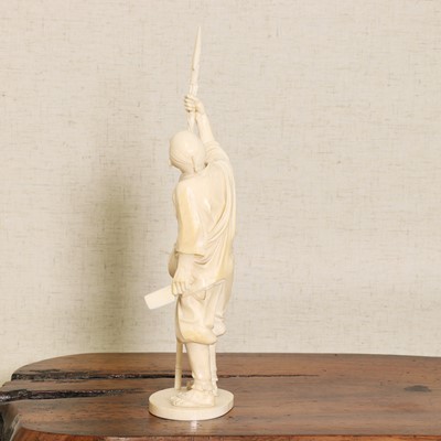 Lot 217 - A Japanese ivory okimono
