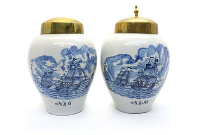 Lot 105 - A pair of Dutch delft blue and white vases
