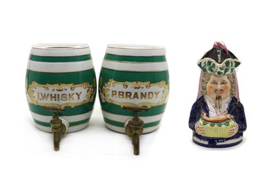 Lot 40 - A pair of Staffordshire 'Whiskey' and 'Brandy' barrels