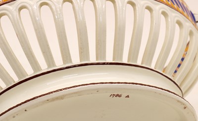 Lot 48 - A Spode creamware chestnut basket and stand