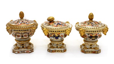 Lot 43 - A pair of Derby porcelain pastille burners and covers