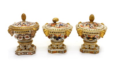 Lot 43 - A pair of Derby porcelain pastille burners and covers