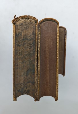 Lot 175 - A pair of faux leather bookends