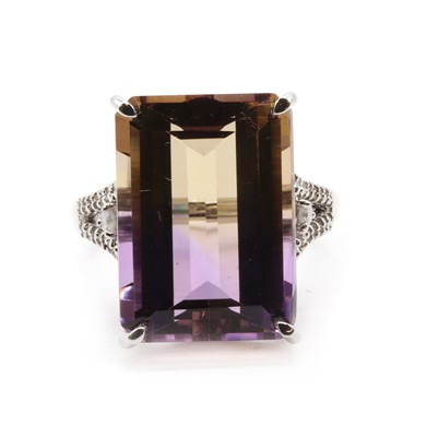 Lot 308 - A 9ct white gold ametrine and diamond ring