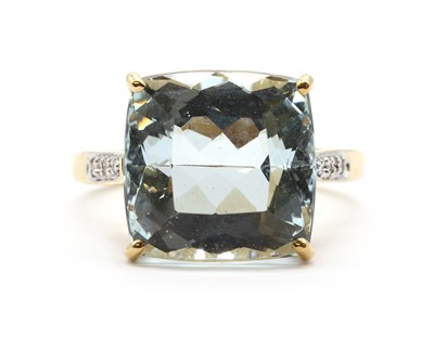 Lot 166 - An 18ct gold aquamarine and diamond ring