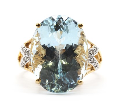 Lot 167 - An 18ct gold aquamarine and diamond ring