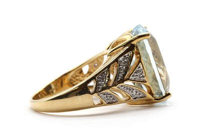 Lot 279 - An 18ct gold aquamarine and diamond ring
