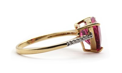 Lot 180 - An 18ct gold rubellite tourmaline and diamond ring