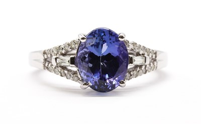 Lot 176 - An 18ct white gold tanzanite and diamond ring