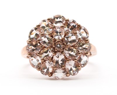 Lot 114 - A 9ct rose gold morganite cluster ring