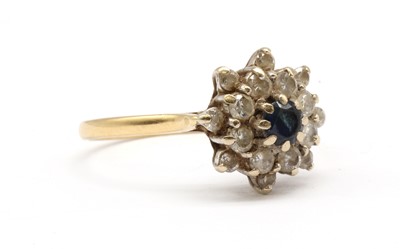 Lot 193 - An 18ct gold sapphire and diamond cluster ring