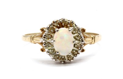 Lot 236 - A 9ct gold opal and diamond cluster ring
