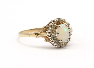 Lot 236 - A 9ct gold opal and diamond cluster ring