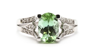 Lot 138 - A 9ct white gold tourmaline and diamond ring