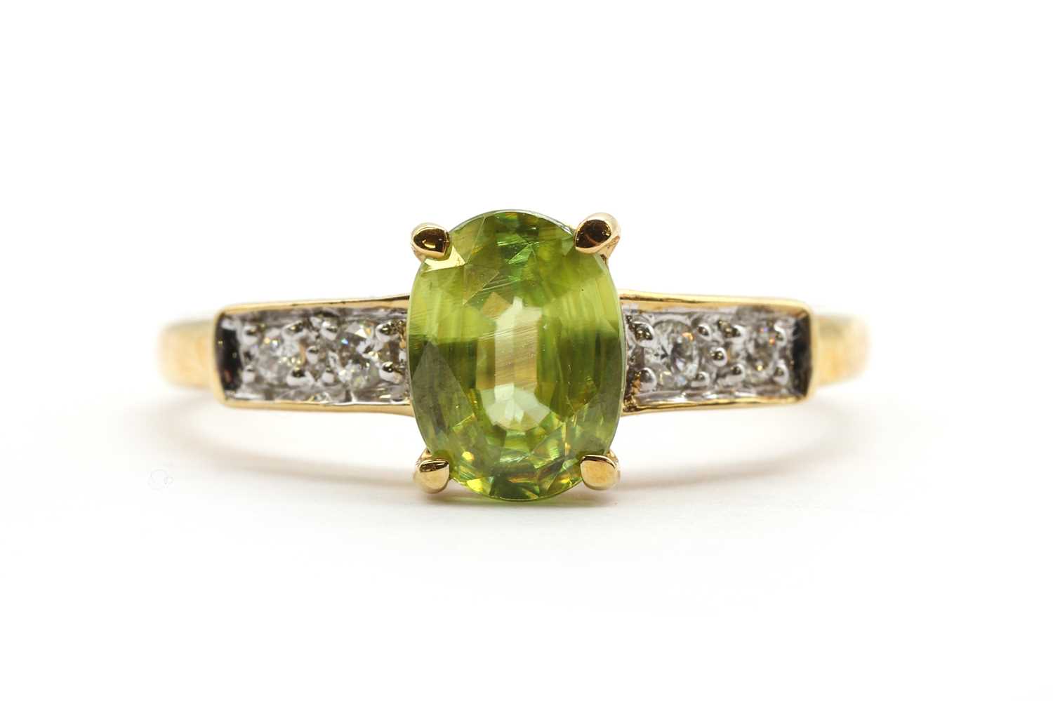 Lot 172 - An 18ct gold sphene and diamond ring