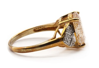 Lot 211 - A 9ct gold rutilated quartz and diamond ring