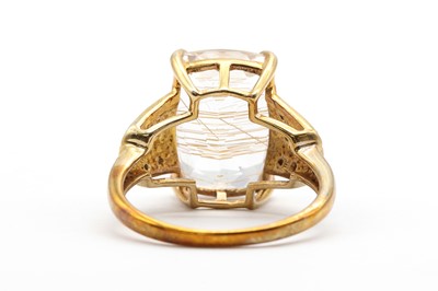 Lot 169 - A 9ct gold rutilated quartz and diamond ring