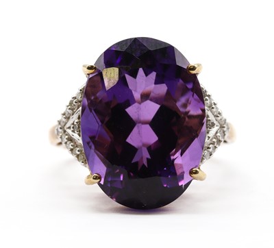 Lot 187 - A 9ct gold amethyst and diamond ring