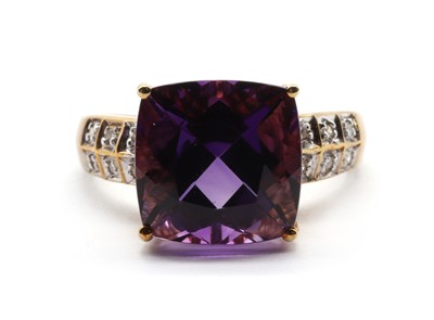 Lot 303 - A 9ct gold amethyst and diamond ring